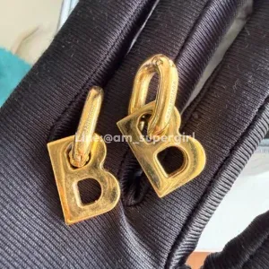 Balenciaga B Chain earrings in gold